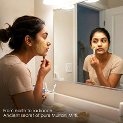 Applying MB Herbals Fullers Earth face mask showing even coverage and quick application