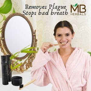 MB Herbals charcoal blended into hair mask being applied for scalp care