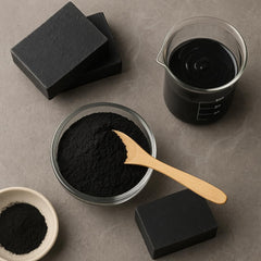 MB Herbals charcoal used in a black cake showing dramatic food coloring effect