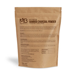 MB Herbals open pouch close-up of fine charcoal powder texture and purity