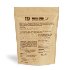 MB Herbals open scoop of green clay powder highlighting fine texture and mixing ease