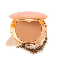 MCoBeauty compact front view showing sleek case and convenient mirror benefit