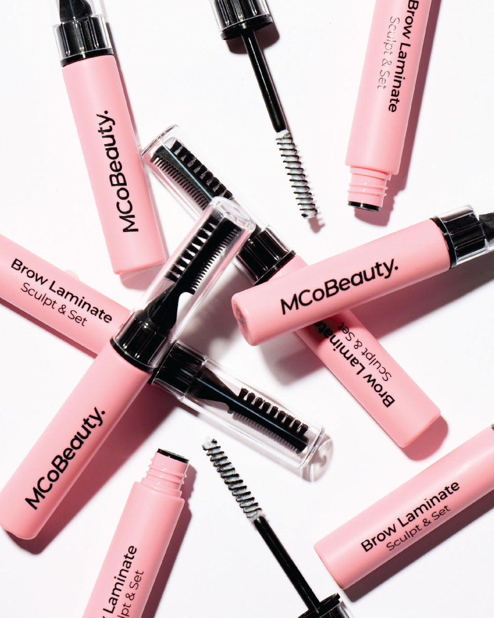 MCoBeauty spoolie and dual-sided styling tool detail for precise shaping and control