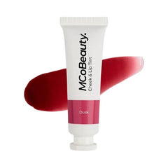 MCoBeauty tube front view showing Dusk Cherry Red shade and compact size benefit