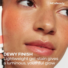 MCoBeauty lip stain close-up showing juicy cherry finish and long-wear benefit
