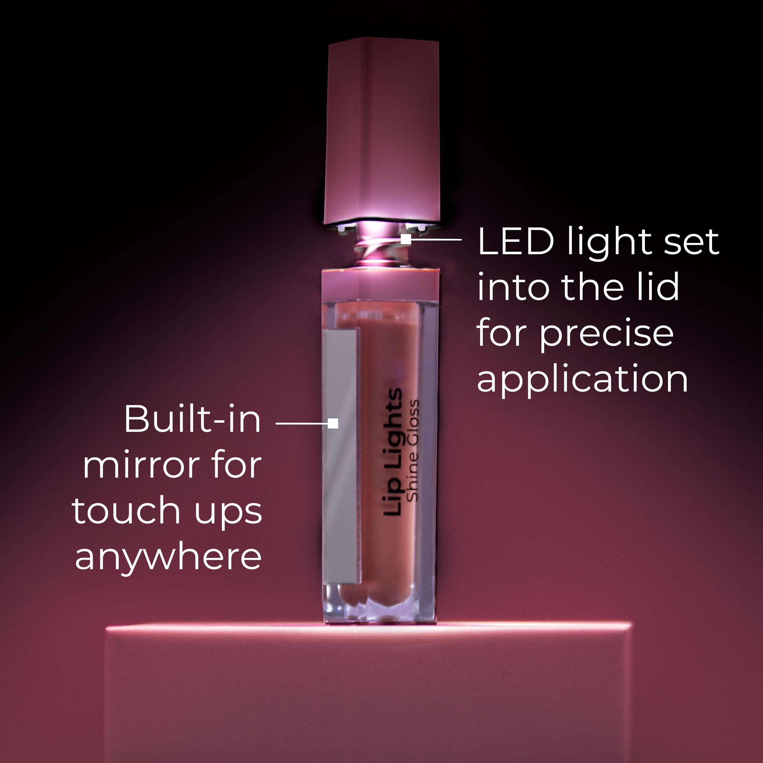 MCoBeauty gloss layered over matte lipstick adding reflective dimension