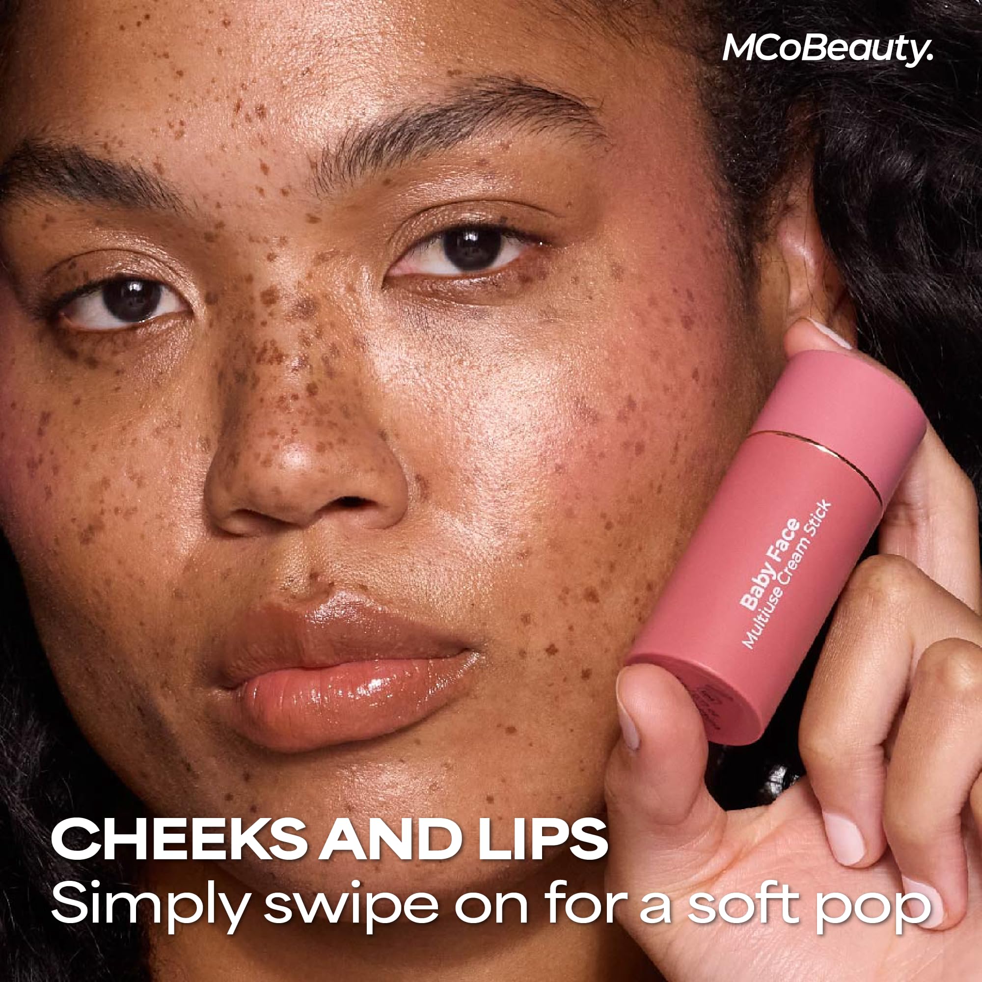 MCoBeauty Lucy applied on lips closeup showing pigmented rose tint and hydrated finish