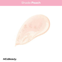 MCoBeauty size comparison next to coin demonstrating travel-friendly 10ml