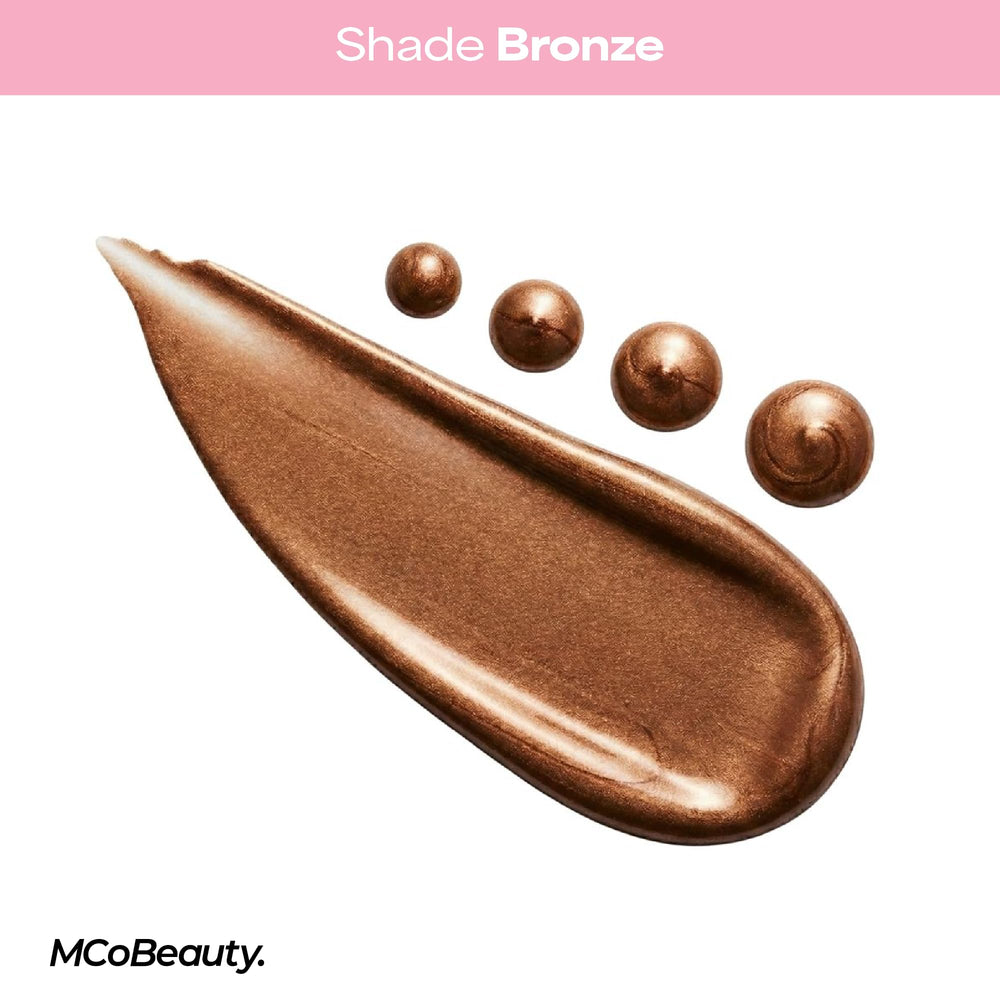 MCoBeauty bronzing drops mixed into moisturiser demonstrating all-over luminous finish