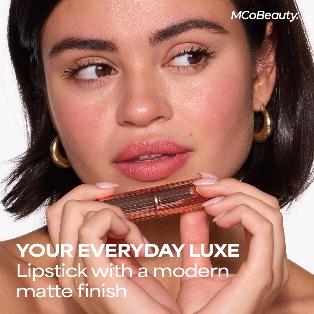 MCoBeauty Very Shelley next to a coin for scale showing compact, travel-friendly size