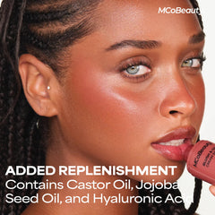 MCoBeauty size comparison in hand highlighting portable twist-up convenience
