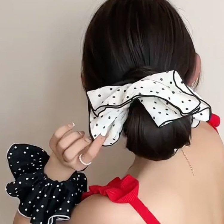 mdgfge scrunchie stretched on hand demonstrating strong elastic and durability