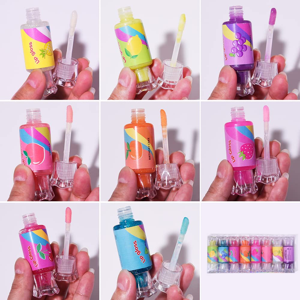 Mebtmel flatlay party favors display with six glosses, ready for gifting