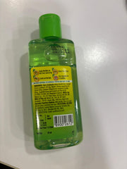 Mediker lifestyle image of person applying oil for smoother hair