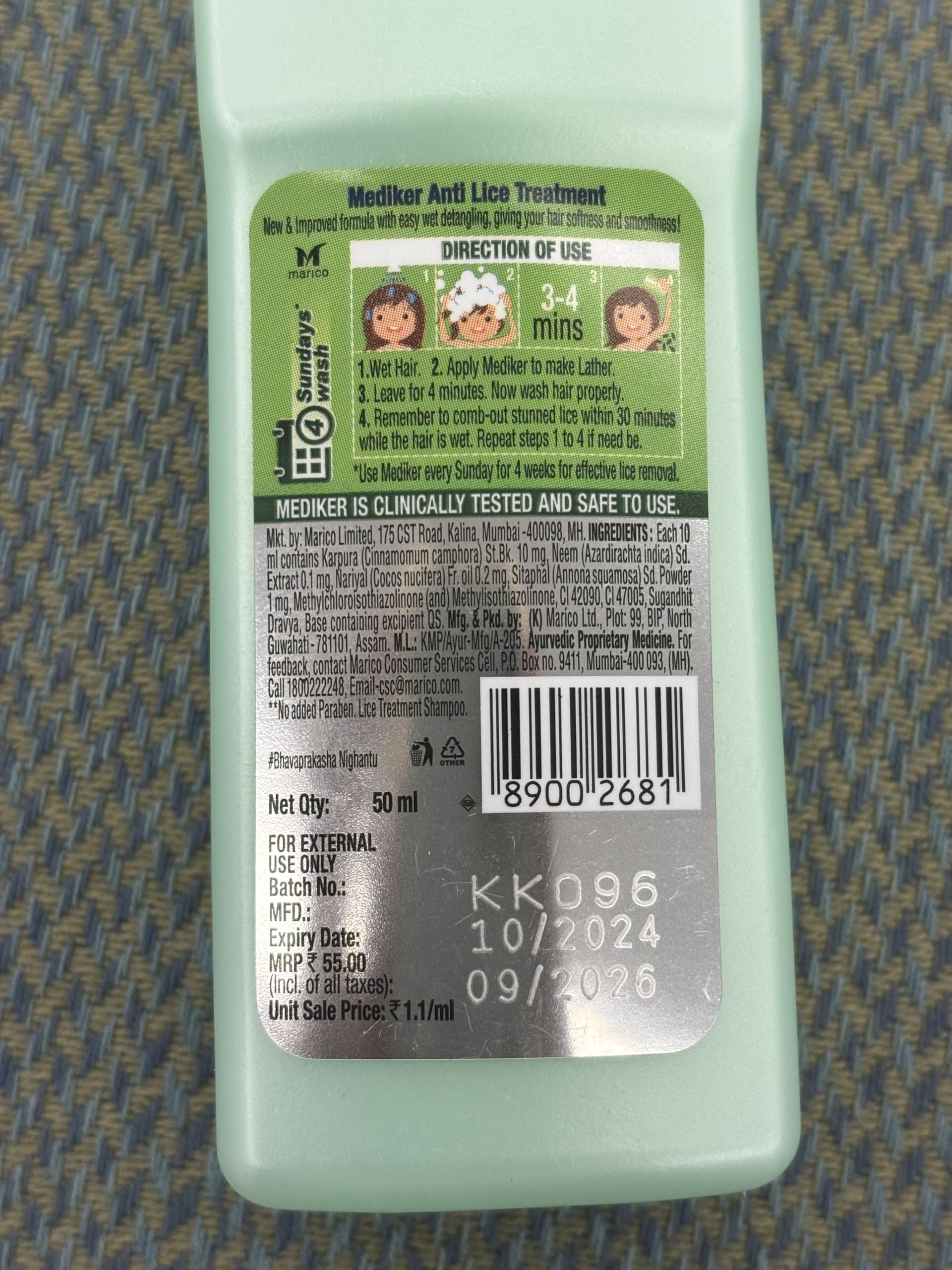 Mediker bottles next to credit card for clear size comparison