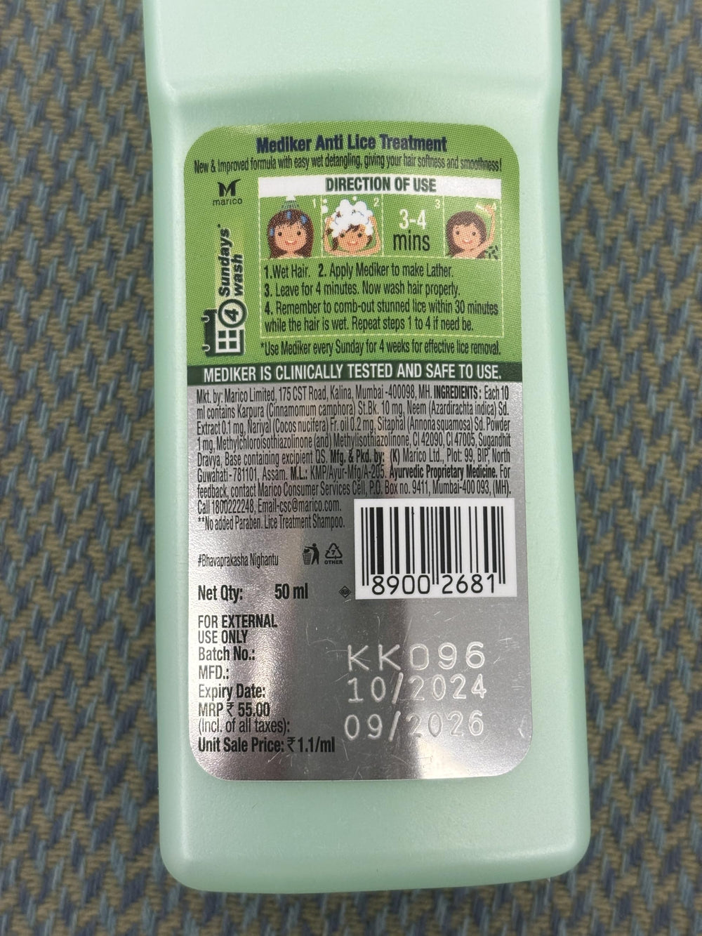 Mediker bottles next to credit card for clear size comparison