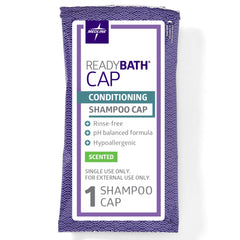 Medline cap held in hand to show scale and easy single-use benefit