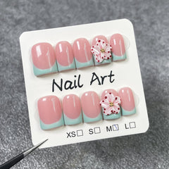 meemooron detail of green French tip and glossy finish highlighting crisp edges