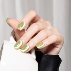 MEGIOR finished manicure on nails showing apple green holographic shine benefit