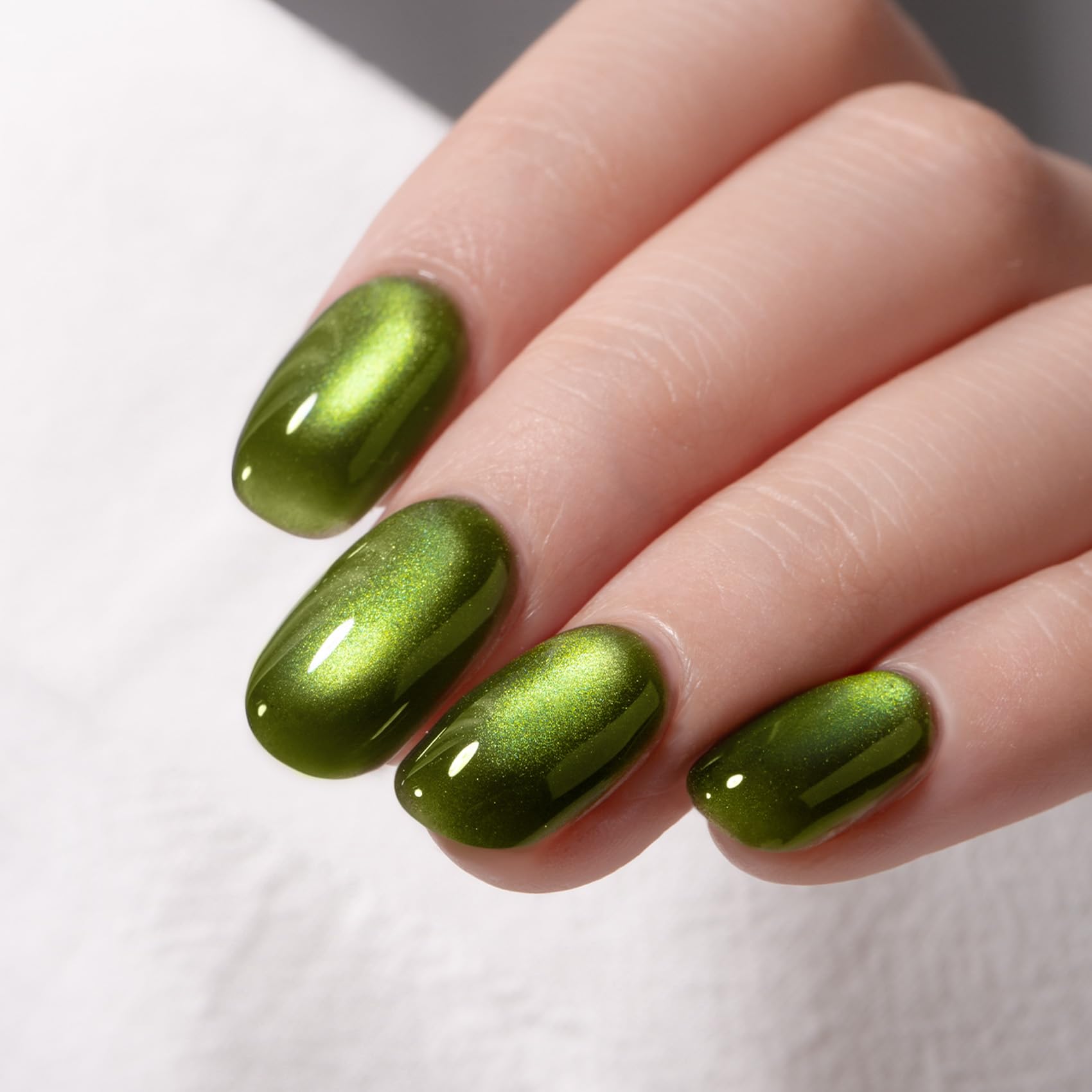 MEGIOR applied on natural nails showing velvet green glow benefit salon-quality results