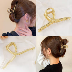 Mehayi clip securing long thick hair in an updo for reliable all-day hold