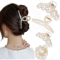 Mehayi front view of four pearl clips showing elegant finish and secure hold