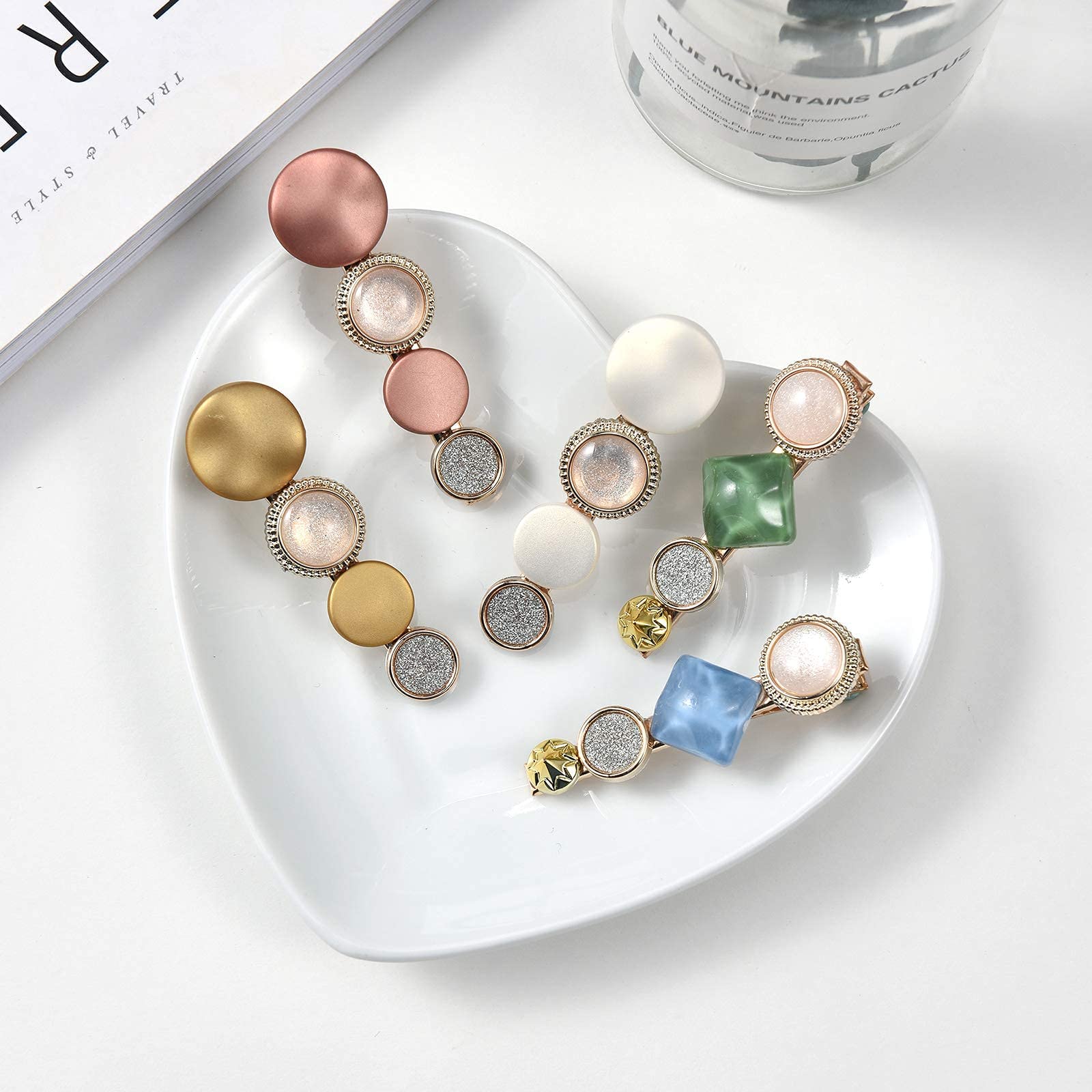 Mehayi geometric alloy clip focus showing gold tone and sturdy design