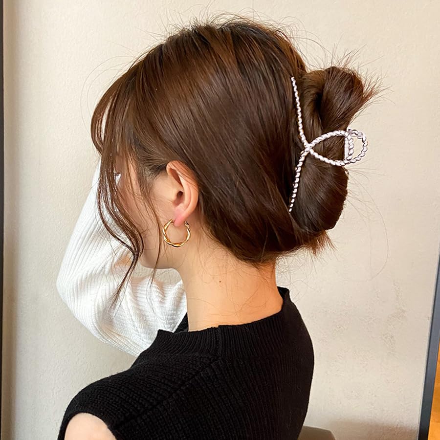 Mehayi in-use securing high bun on long hair for reliable all-day hold