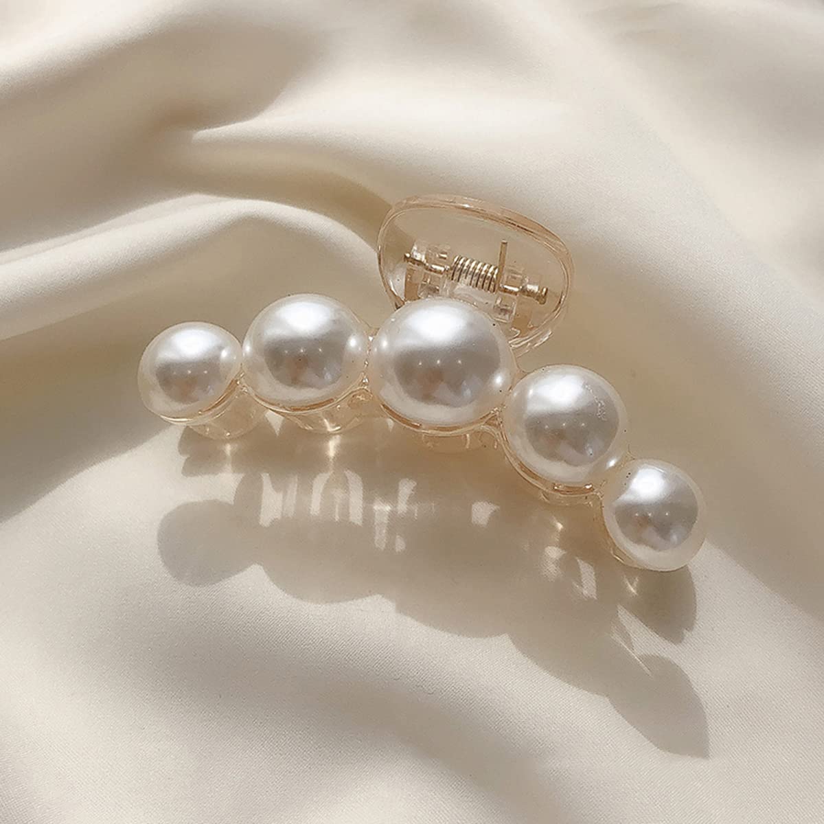 Mehayi styled on model at party showcasing decorative pearls for elegant looks