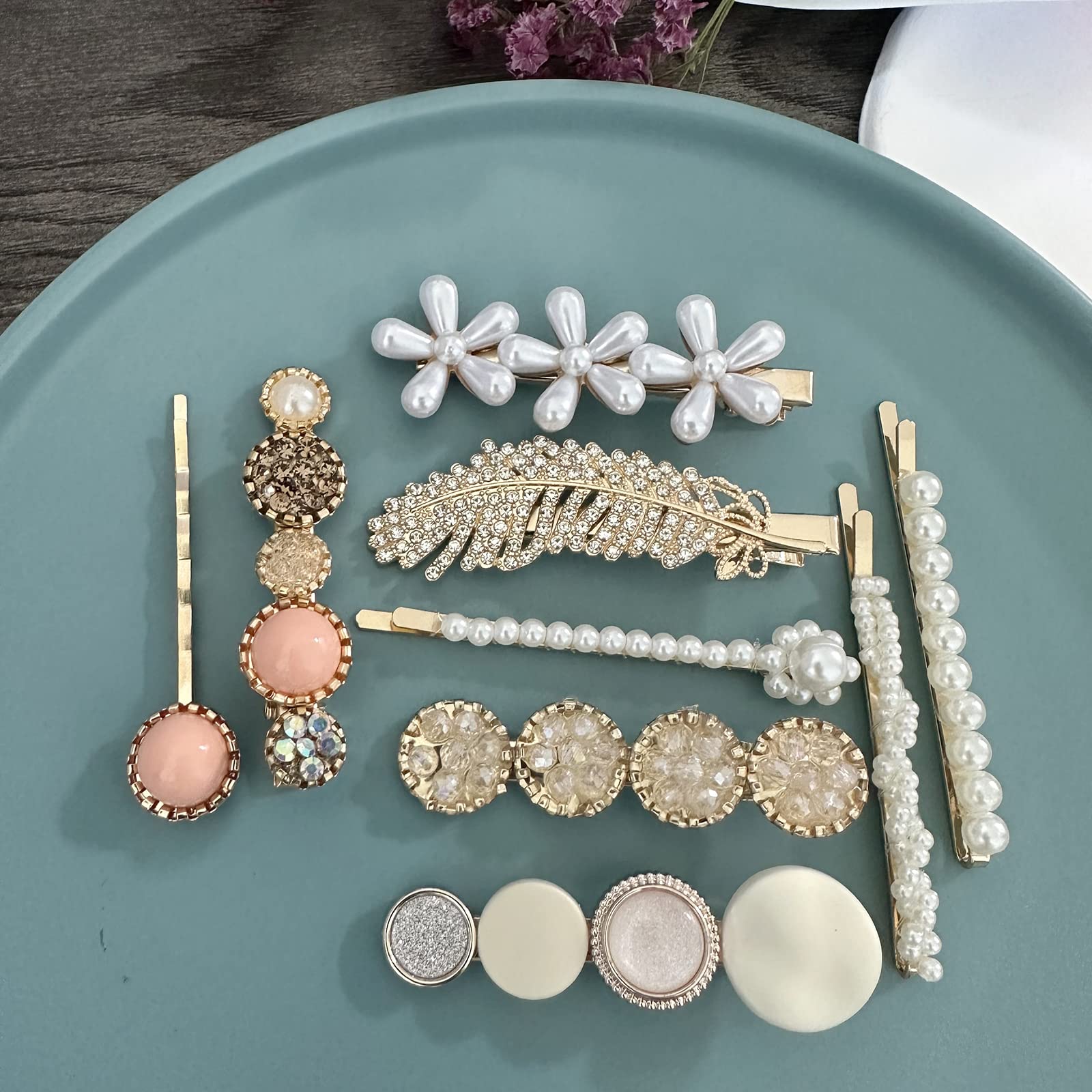 Mehayi hand holding clips to show scale and ease of everyday use