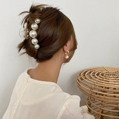 Mehayi side profile with open jaw highlighting strong hinge and grip benefit