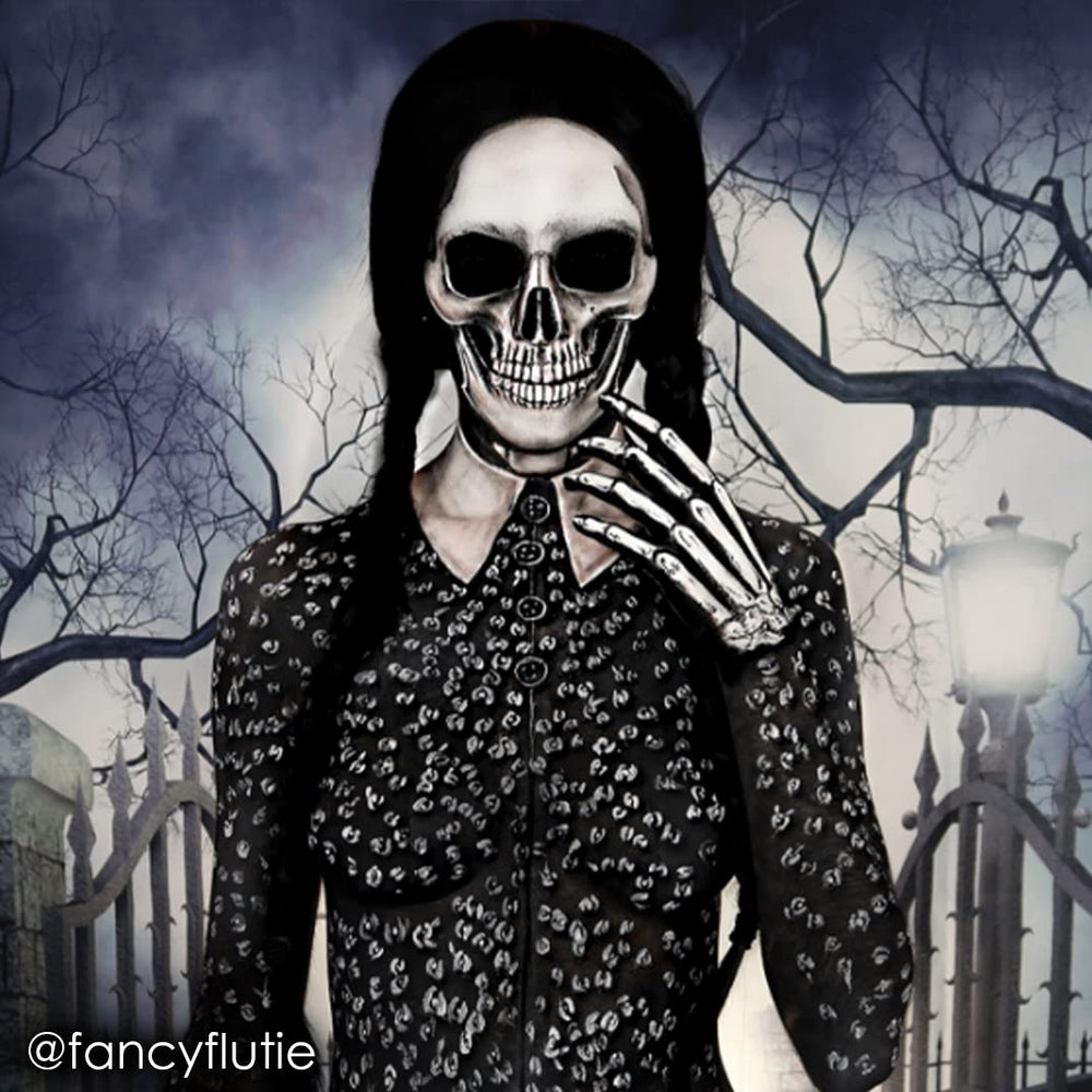 Mehron Paradise black paint applied on hand illustrating buildable, even color payoff