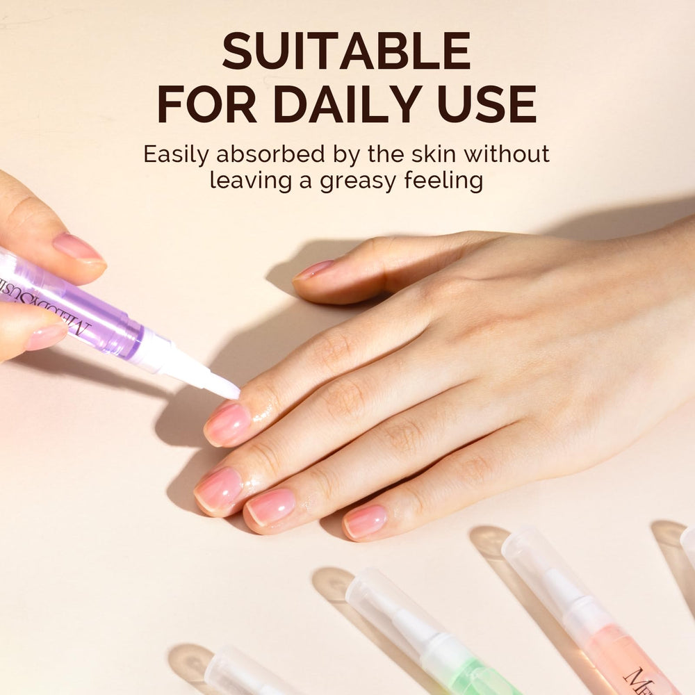 MelodySusie lifestyle image applying oil to nails for softer cuticles