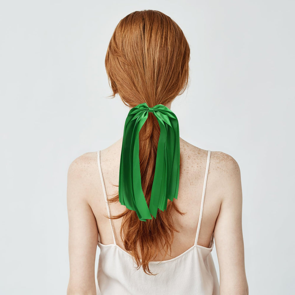 melyde model wearing high ponytail showcasing ribbon tails for polished look