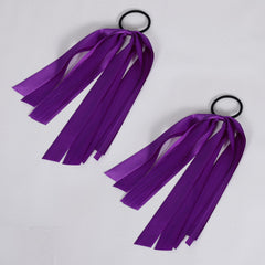 melyde ribbon hair tie in holiday party setting shows festive feminine accent