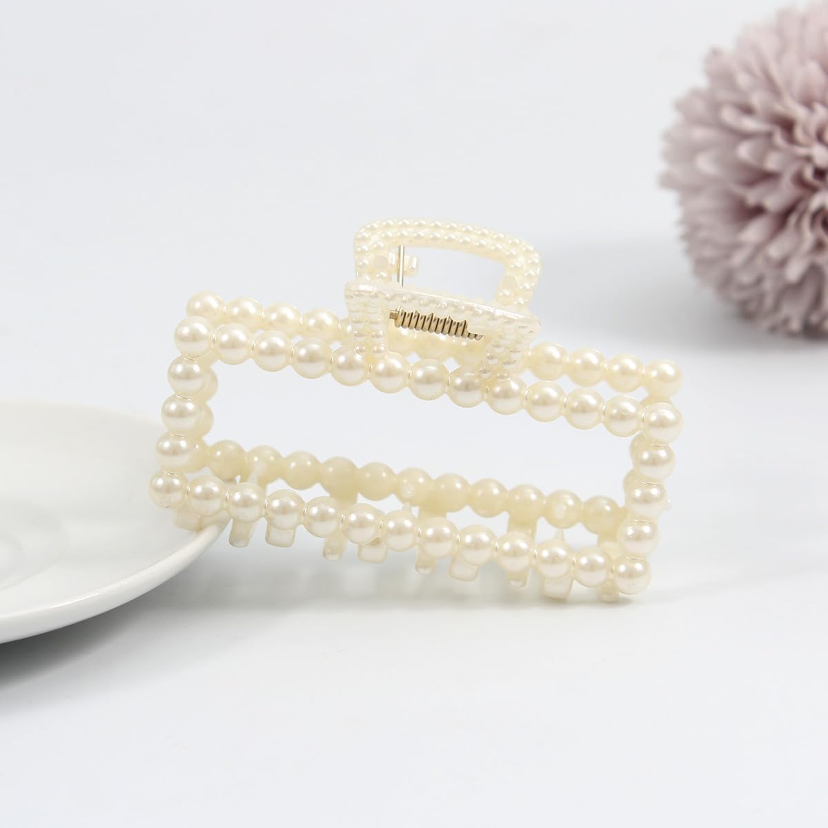 Merdia stored in travel pouch protecting clips and keeping pearls pristine