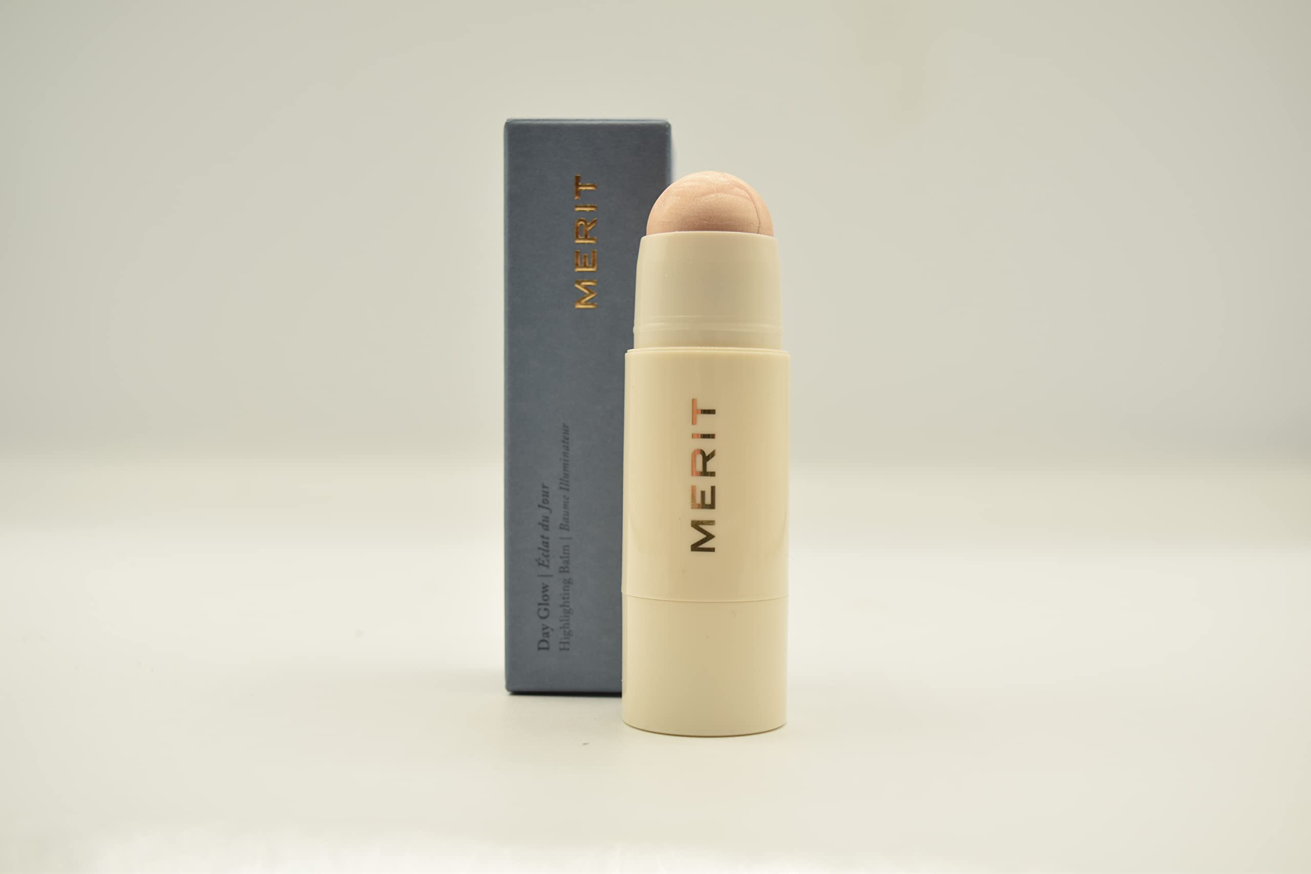 Merit Day Glow texture close-up displaying creamy finish and instant skin hydration