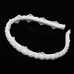 Merroyal headband worn for First Communion, complements formal attire