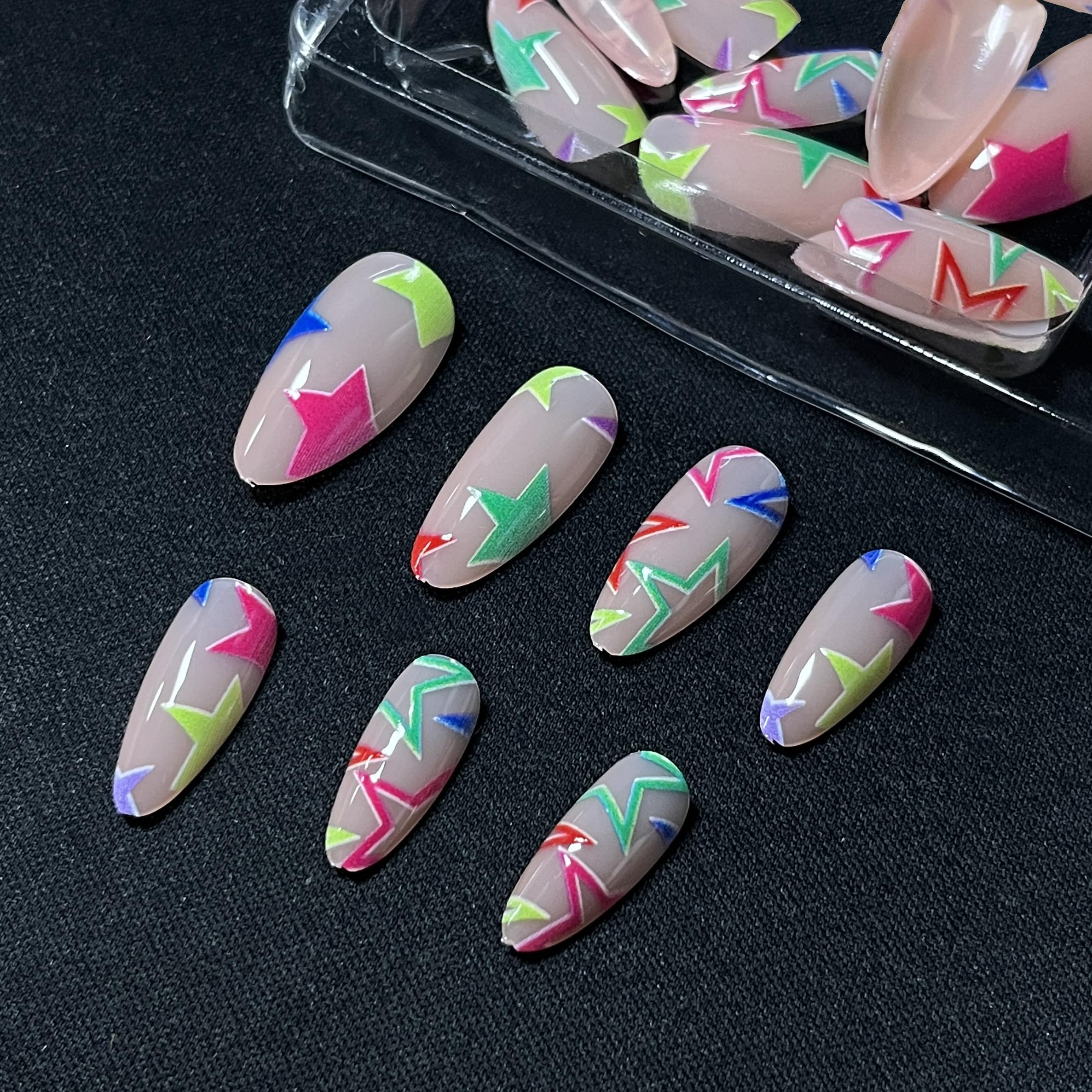 MERVF close-up of star design detail on a nail showcasing vibrant neon pattern and precise decoration