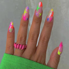 MERVF front packaging of 24 almond press-on nails showing neon Y2K stars and glossy finish for instant style