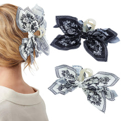 Mesovor front view of two bow clips showing colors and pattern, stylish accessory