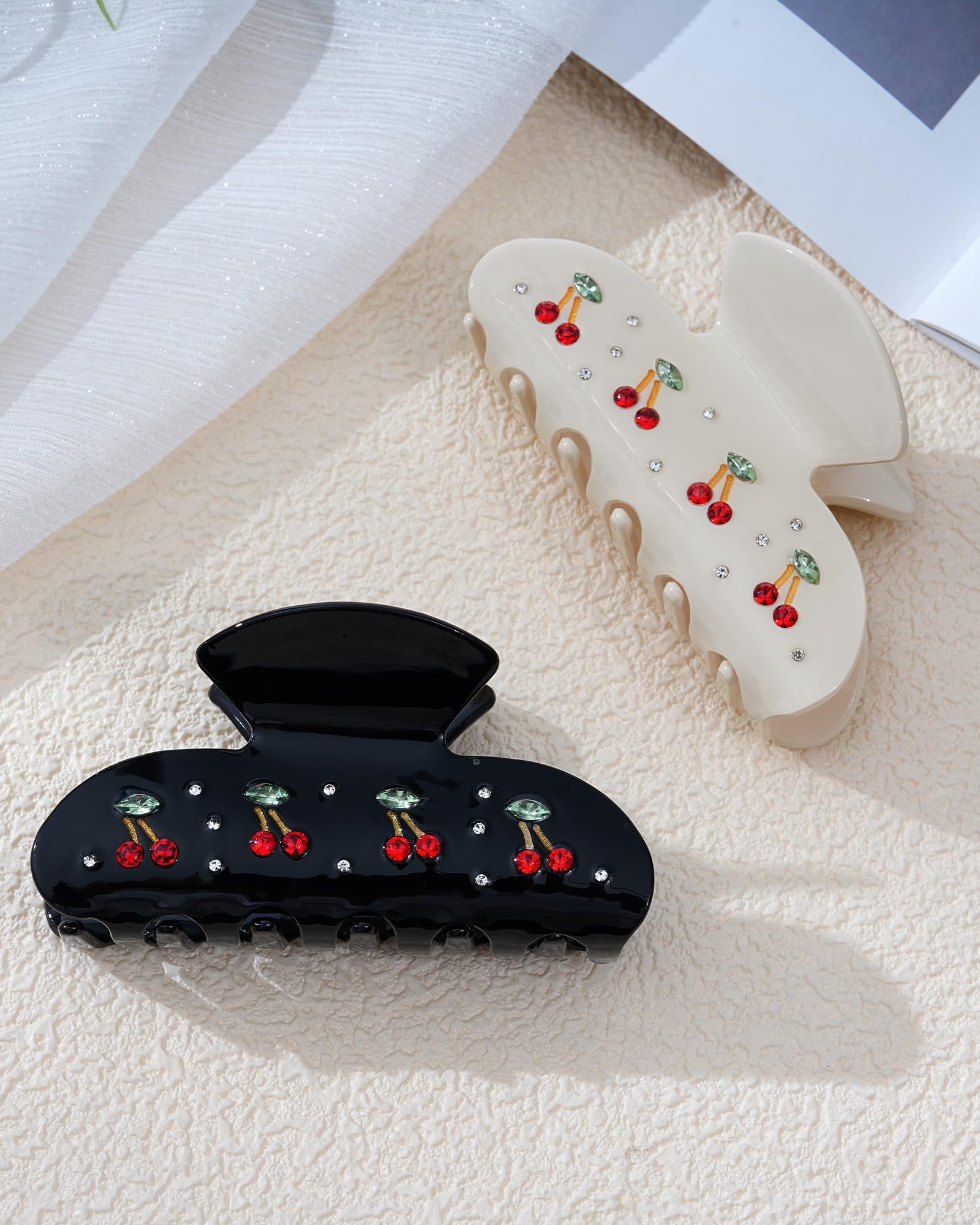Mesovor front view of two cherry clips showing shape and color for easy styling