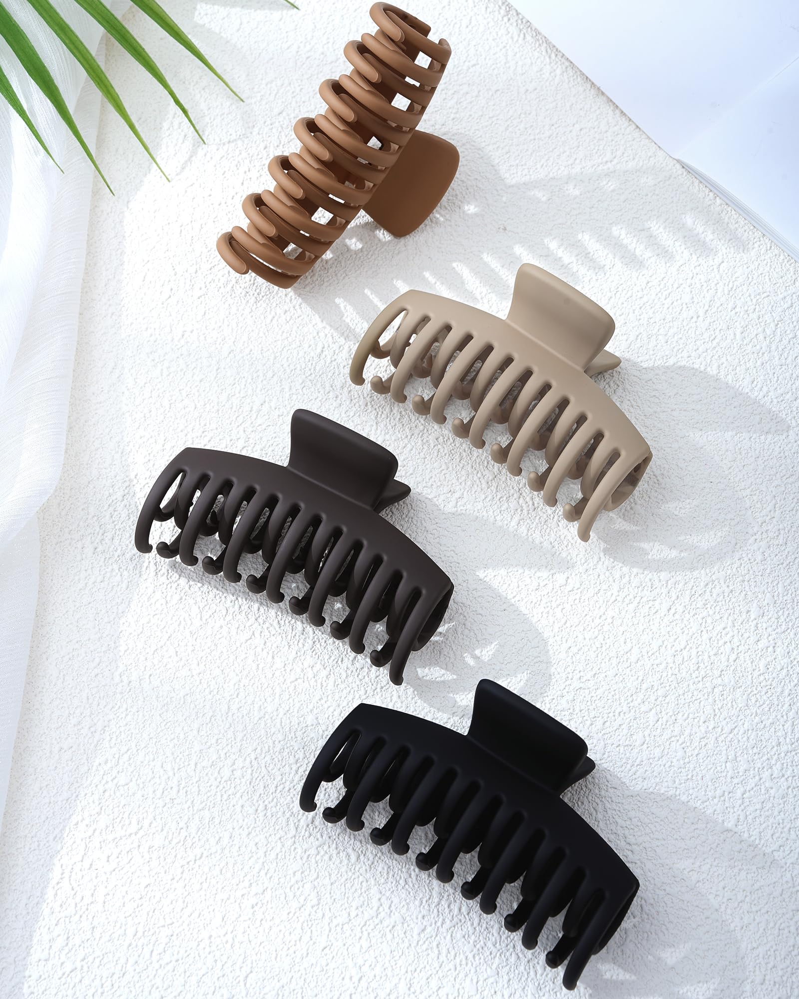 Mesovor four neutral clips styled on a dressing table showing outfit-matching benefit