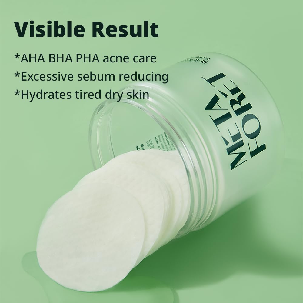 META FORET pad being swept across cheek to remove dead skin