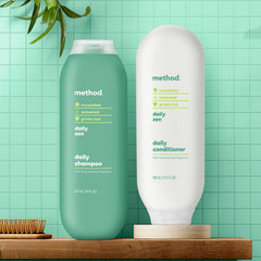 Method 14oz bottle next to ruler showing size and travel‑friendly capacity