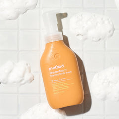 Method bottle on shower shelf with steam showing in-use freshness benefit: spa-like experience