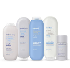 Method Simply Nourish bottle on bathroom shelf staged with towel to show calming scent and daily care benefit