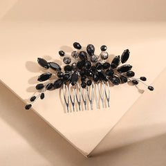 Metuynm comb next to ruler showing 5.3-inch length for scale and styling planning