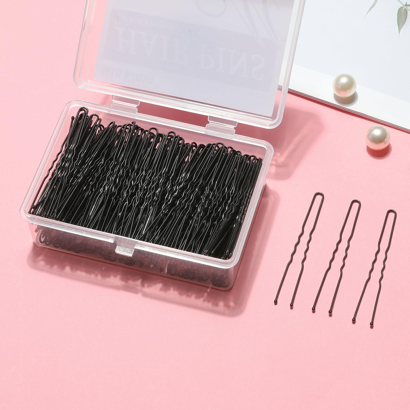 Mia Klein pin length next to ruler illustrating 2.4 inch size for deep anchoring in buns