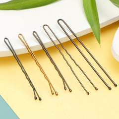 Mia Klein pins held in hand to show scale and easy-grab convenience
